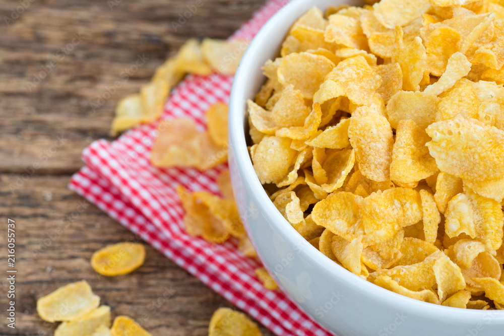 Cornflake cereals on white bowl with close up shot. Cornflake cereals on white bowl with close up shot.