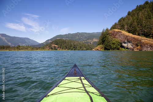 Kayaking in Harrison River during a beautiful and vibrant summer day. Located East of Vancouver, British Columbia, Canada. © edb3_16