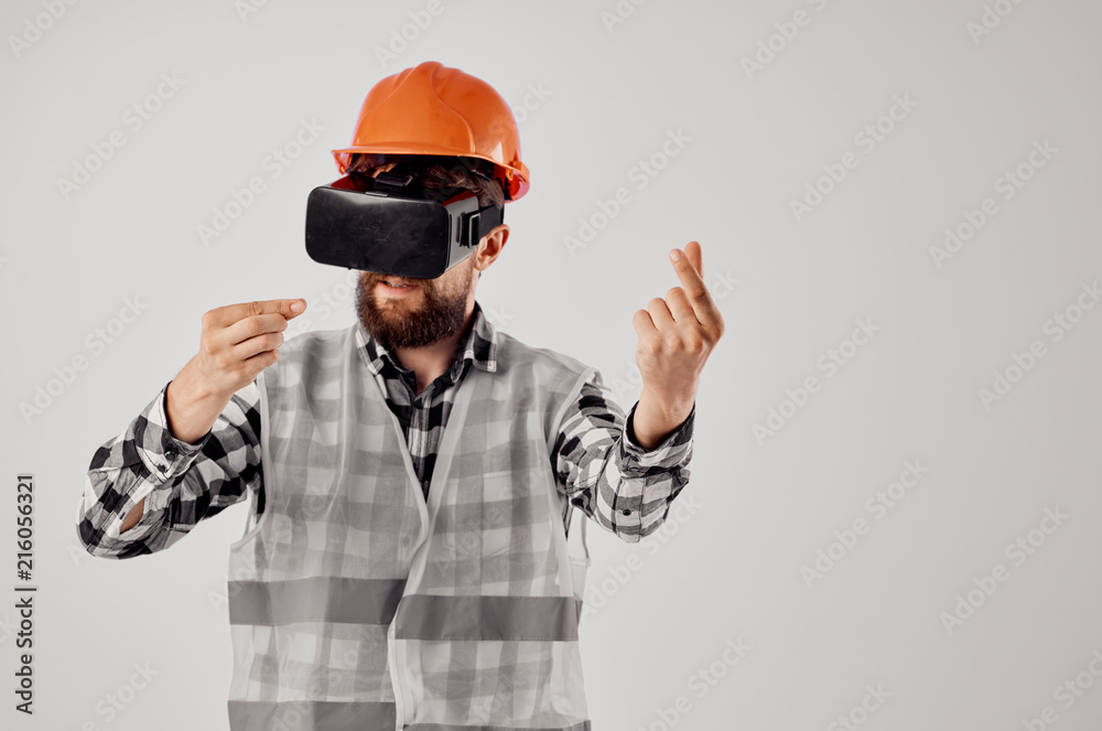 architect in a helmet in 3d glasses virtual reality