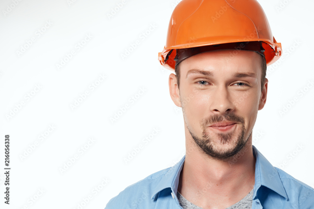 architect in an orange helmet on an isolated background architect in an orange helmet on an isolated background