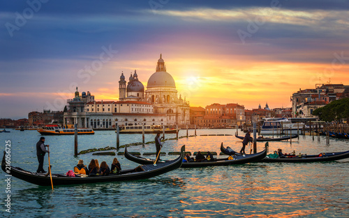 Grand Canal with gondolas in Venice, Italy. Sunset view of Venice Grand Canal. Architecture and landmarks of Venice. Venice postcard © daliu