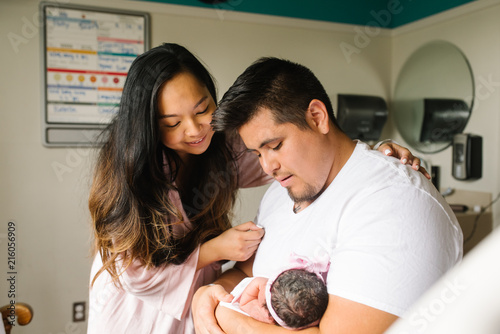 Mother and father with newborn
