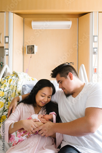 Mother and father with newborn