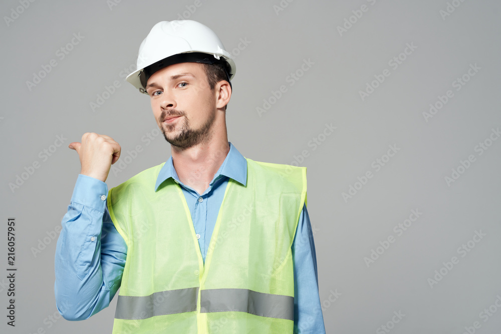 serious builder in a white helmet