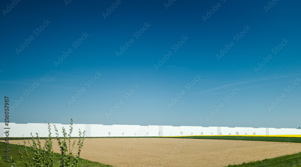 White factory and clear blue sky on sunny day 