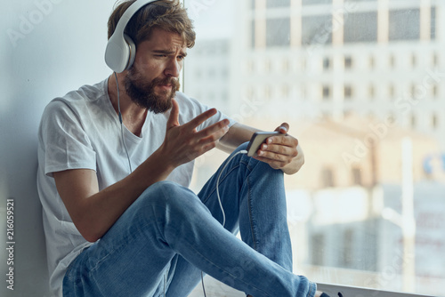 man in headphones listening to music