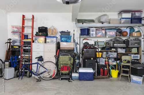 Garage storage shelves with vintage objects and equipment. photo