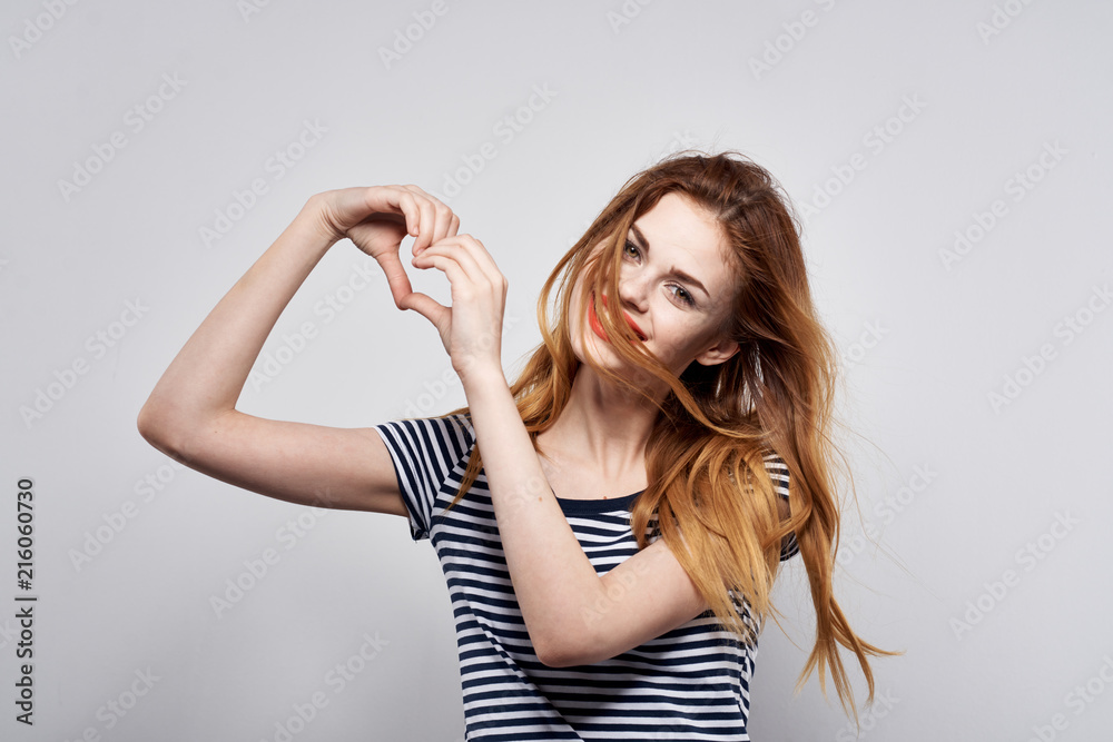 Fototapeta premium heart fingers woman