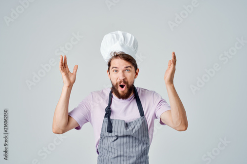 surprised cook with hands up