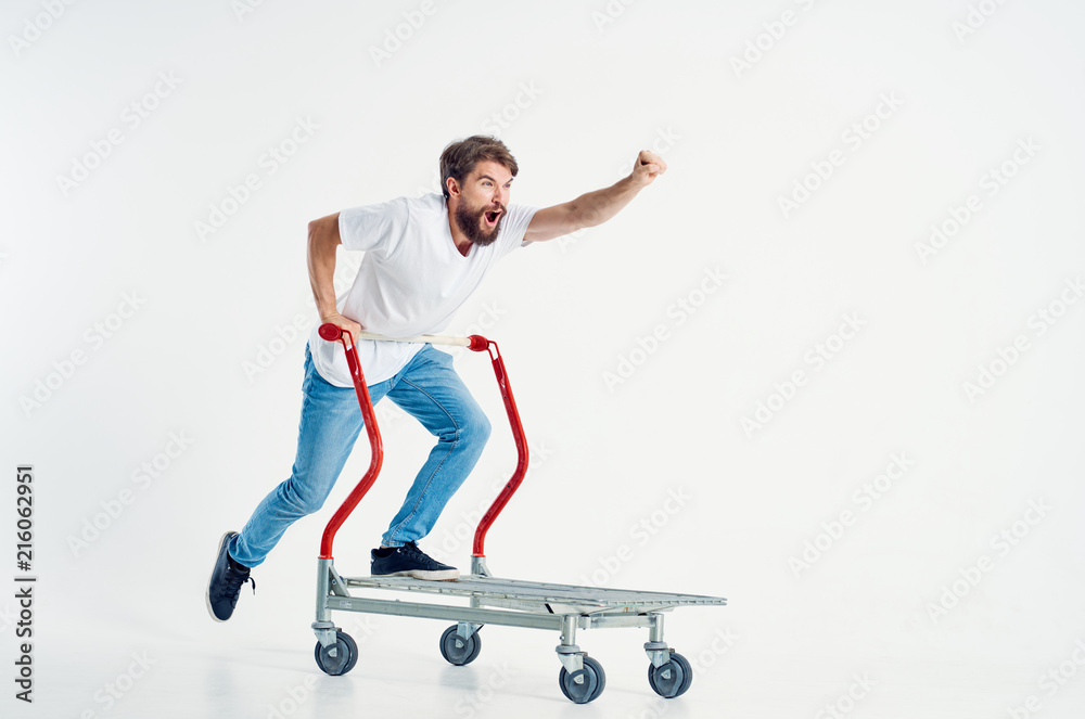 man riding a trolley