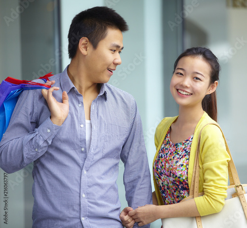 young asian couple shopping photo