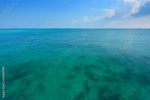 Tropical sea and blue sky with sun.