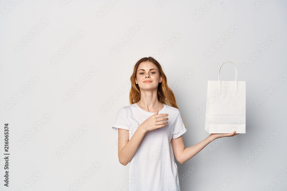 woman holds package woman holds package