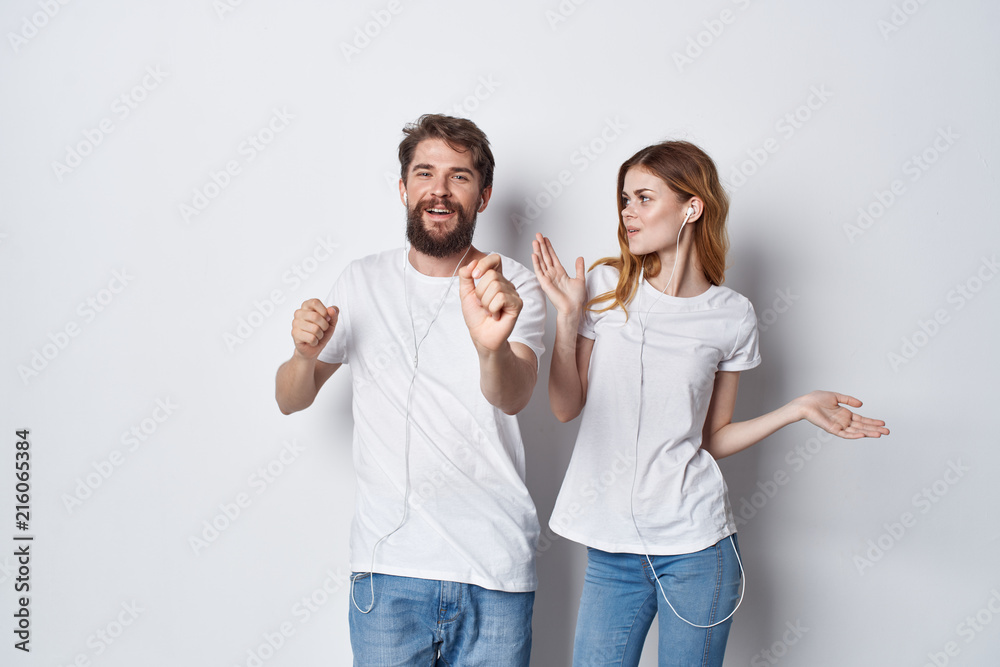 man and woman in white t-shirts man and woman in white t-shirts