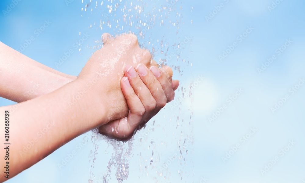 Fototapeta premium Man washing hands in clean water