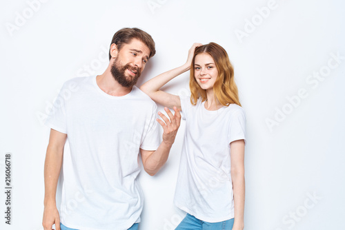 young couple in white t-shirts