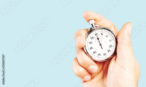 Stopwatch in Human Hand