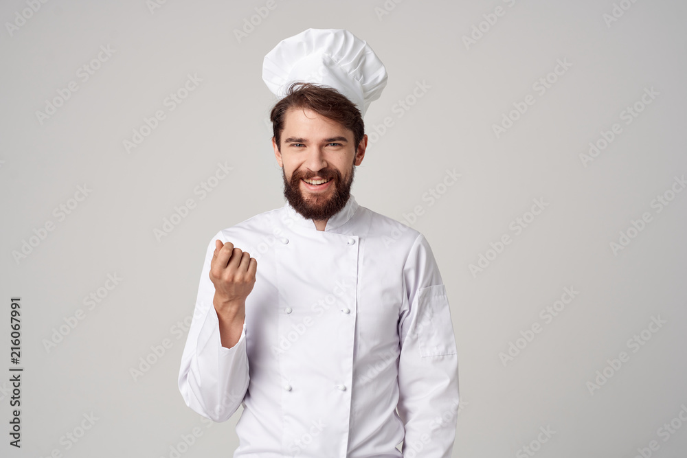 cook man with beard smiling kitchen cooking