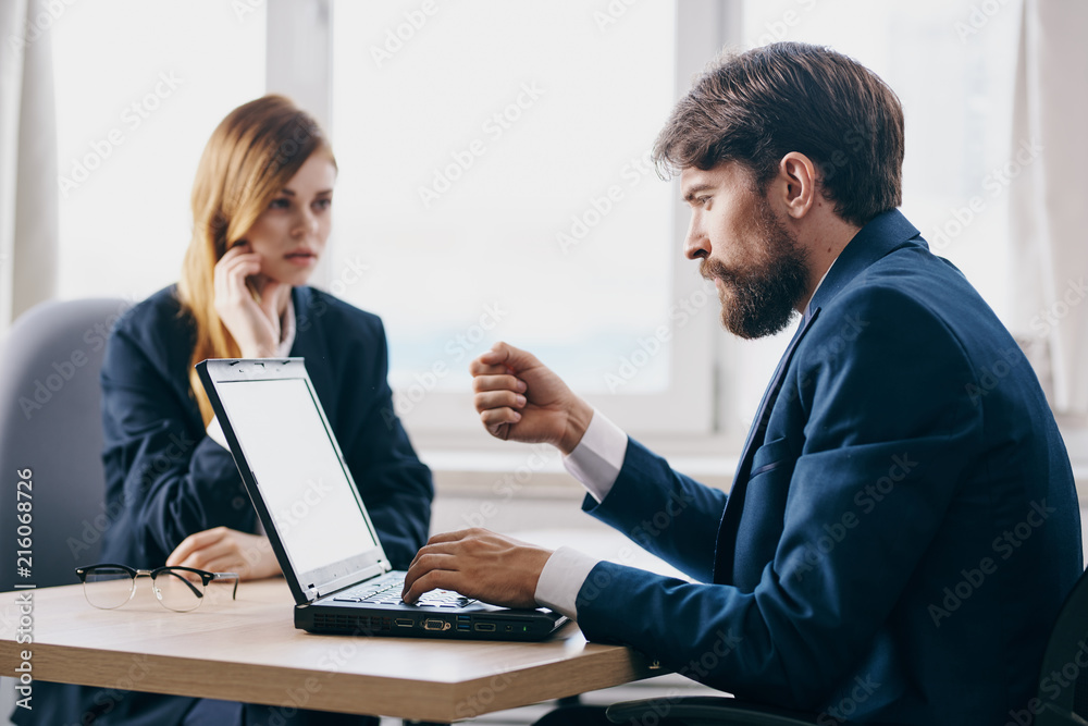 business colleagues in the office are working business colleagues in the office are working