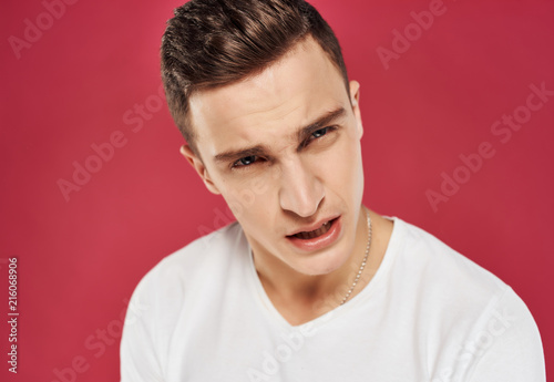 serious man on pink background portrait © SHOTPRIME STUDIO