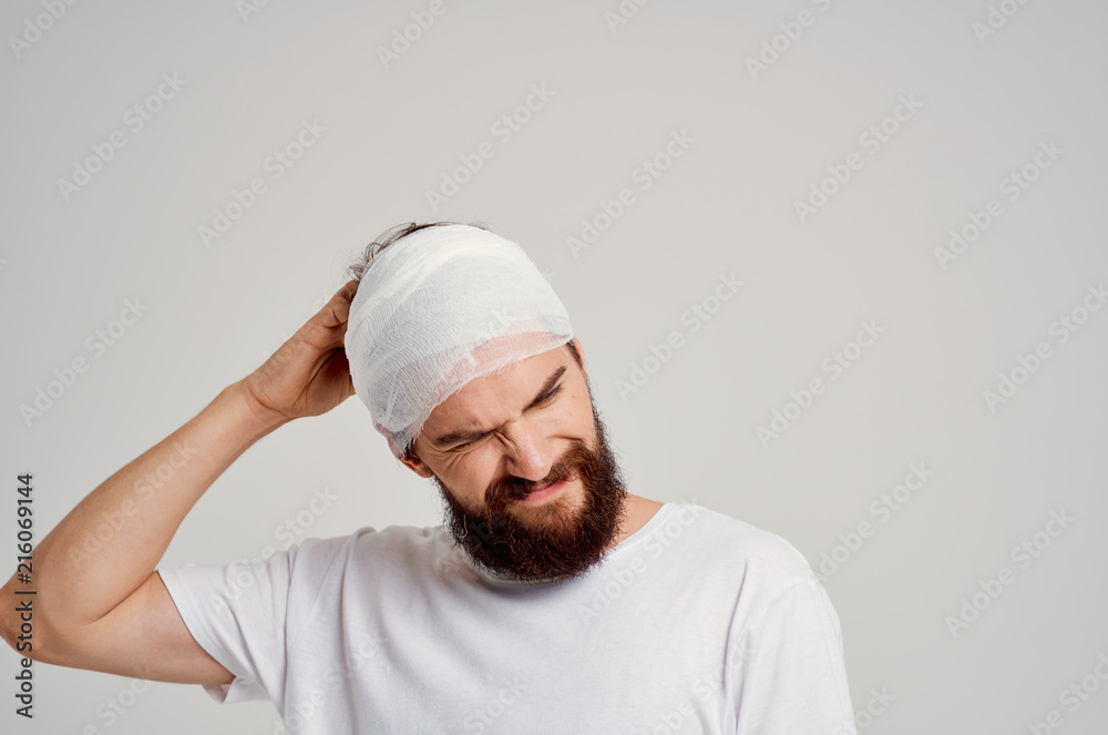 bruise blow man in bandage holding head injury bruise blow man in bandage holding head injury