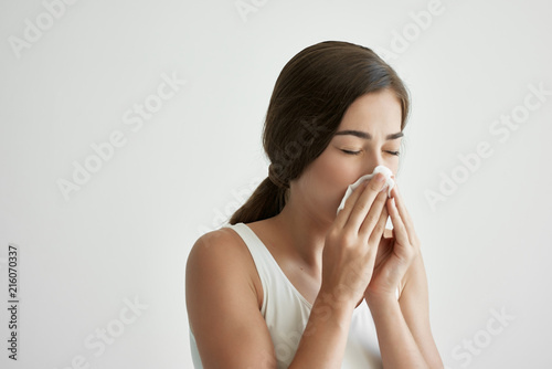 woman blows the flu