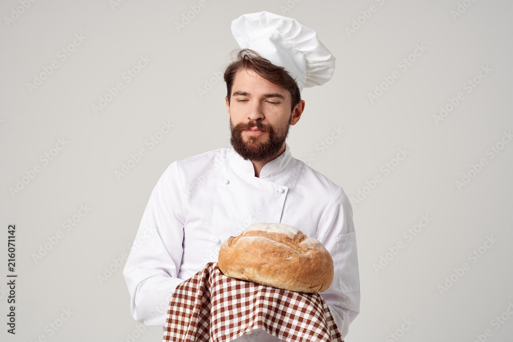 confectioner baked a loaf on a light background confectioner baked a loaf on a light background