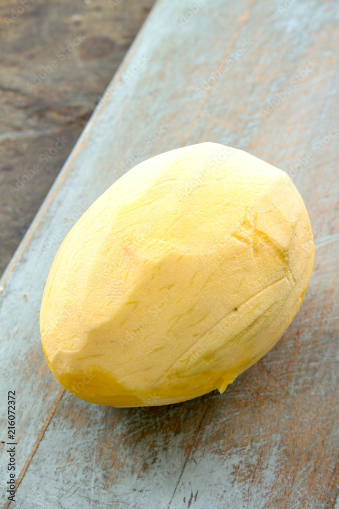 peeled mango fruit
