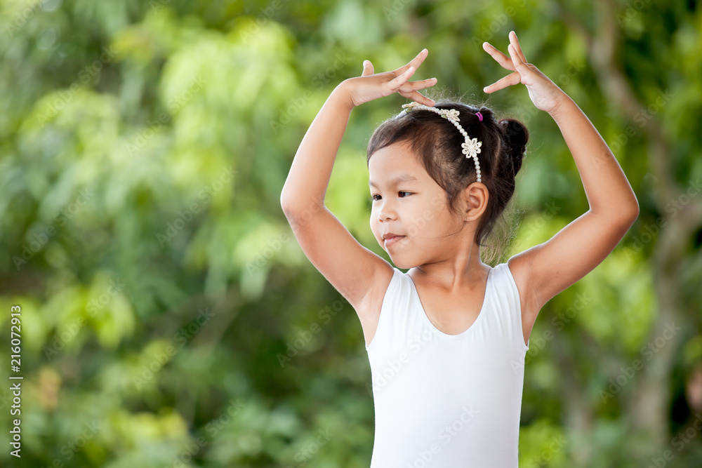 Cute asian child girl is practicing a ballet and dream of become ballerina Cute asian child girl is practicing a ballet and dream of become ballerina