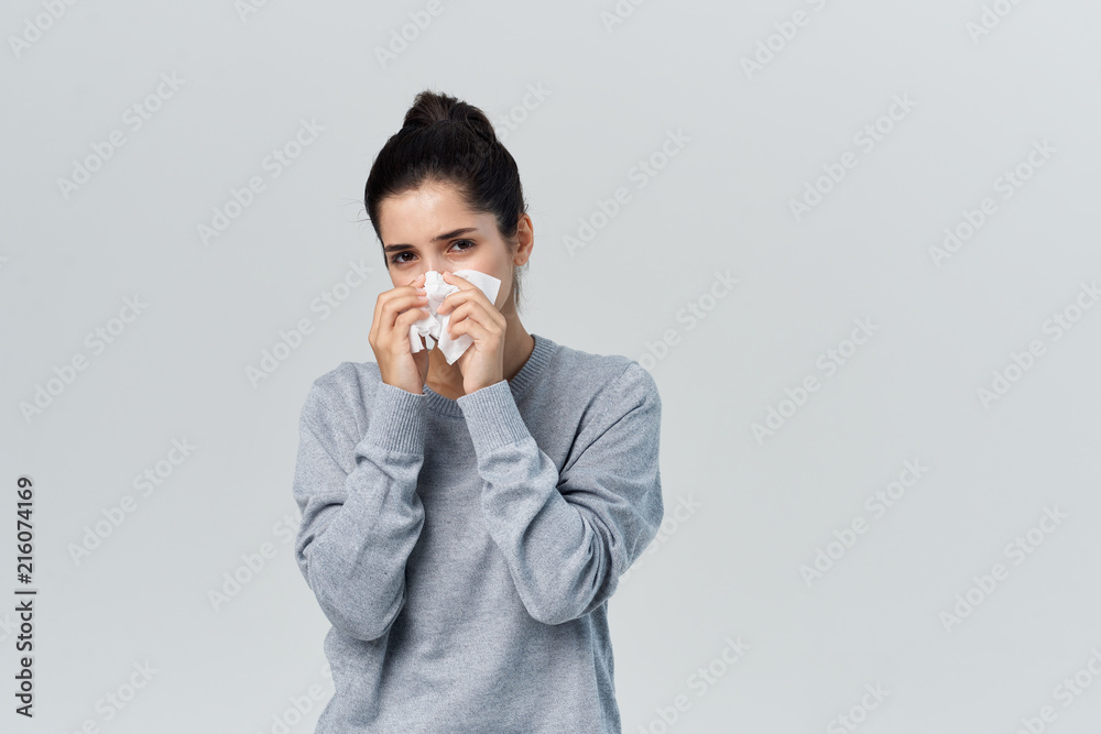 woman blowing the flu