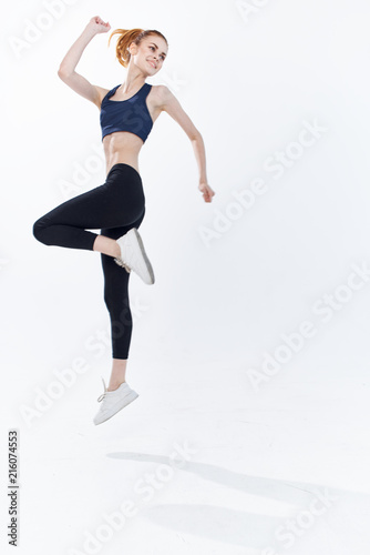 Fototapeta Naklejka Na Ścianę i Meble -  young woman jumping in the air