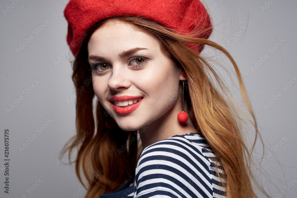 portrait of young woman in red hat portrait of young woman in red hat