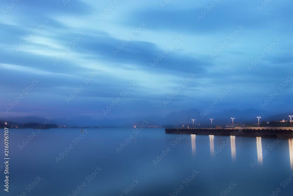 Blured sea and dock background.