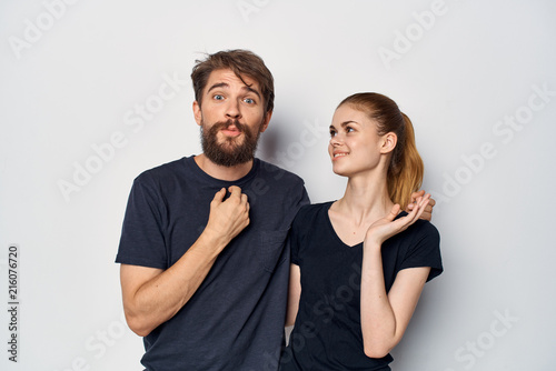 young people on a light background gesturing with their hands