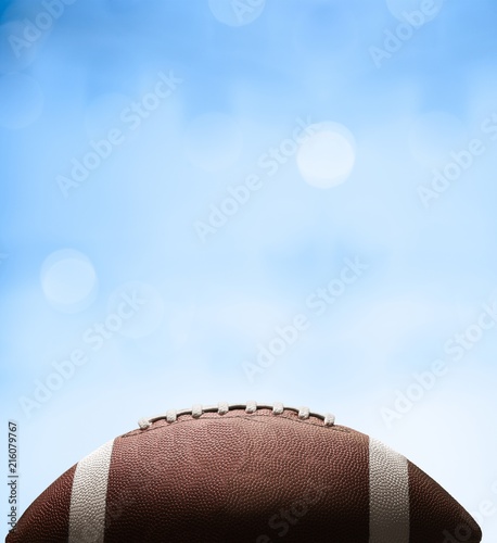 American football ball on background