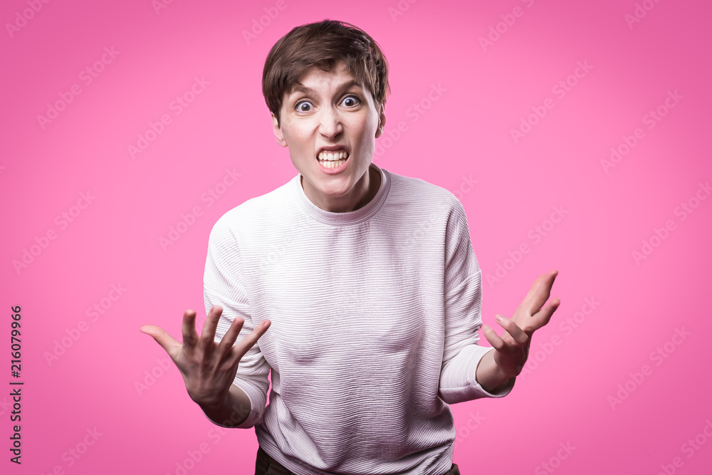 Frustrated and angry woman screaming. Studio shot. Frustrated and angry woman screaming. Studio shot.
