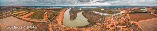 Wide aerial panorama of agricultural fields and winding iconic Murray River in Riverland region of South Australia photo