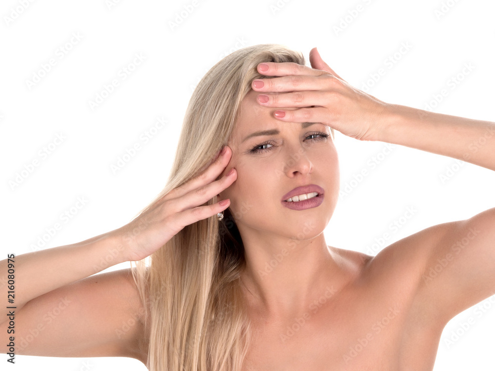 Headache concept - young woman suffering a migraine. Headache concept - young woman suffering a migraine.