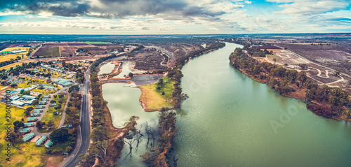 Aerial panorama of holiday park cabins and Murray River in Berri, South Australia