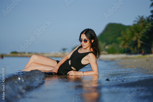 Girl laying on the beach