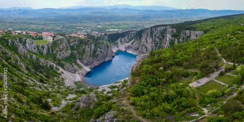Blue Lake (Croatian: Modro jezero or Plavo jezero) is a karst lake located near Imotski in Croatia. It lies in a deep sinkhole possibly formed by the collapse of an enormous cave. photo