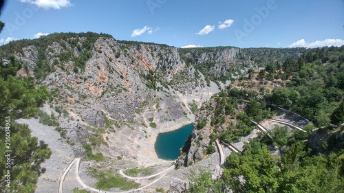 Blue Lake (Croatian: Modro jezero or Plavo jezero) is a karst lake located near Imotski in Croatia. It lies in a deep sinkhole possibly formed by the collapse of an enormous cave. photo