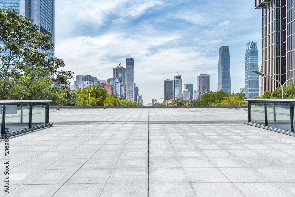 Panoramic skyline and modern business office buildings with empty road,empty concrete square floor