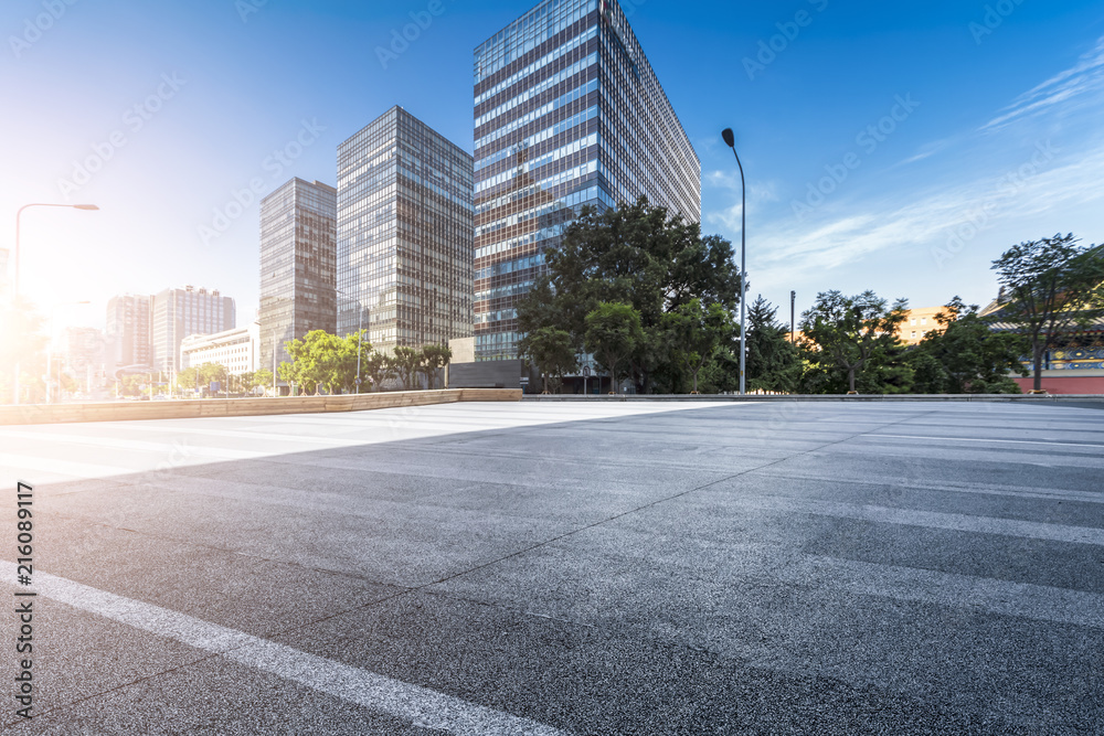 Panoramic skyline and modern business office buildings with empty road,empty concrete square floor