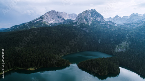 Fototapeta Naklejka Na Ścianę i Meble -  Aerial view at a beautiful lake in the mountains. Black Lake, Montenegro.