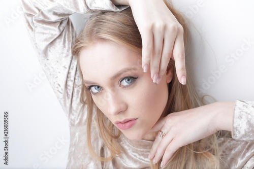 portrait of a stylish confident young woman with daily make-up.