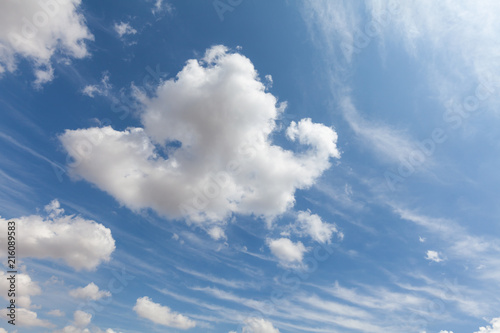 Beautiful white clouds and blue sky background over England UK. Fluffy and wispy cloudscape backdrop 0102