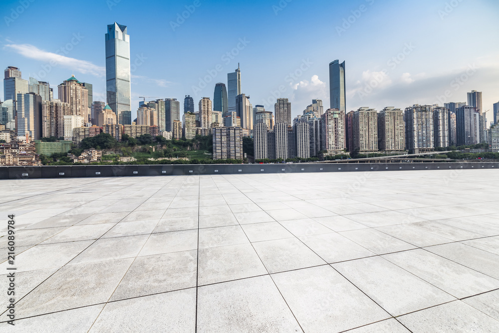 Panoramic skyline and modern business office buildings with empty road,empty concrete square floor