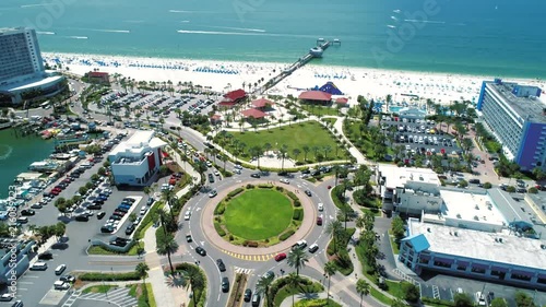 Drone shot circling the Clearwater Beach roundabout following the traffic across the beach
