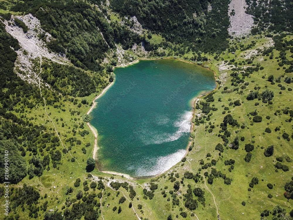 Obraz premium Šator Mountain (Šator planina) is in the Dinaric Alps, Bosnia and Herzegovina. Just below the peak, the Šator Lake (Šatorsko jezero) is positioned.